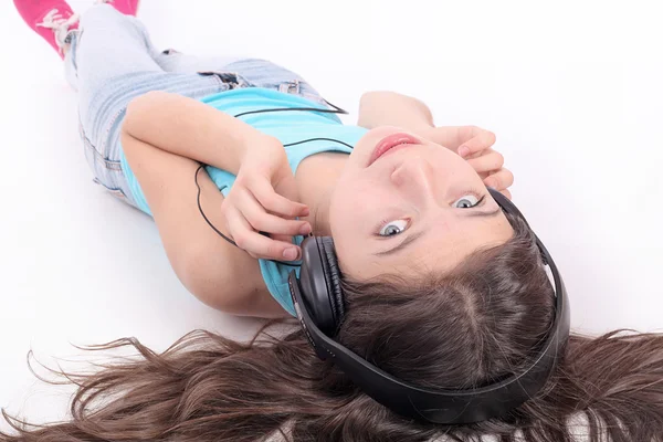 Menina adolescente agradável ouvir música — Fotografia de Stock