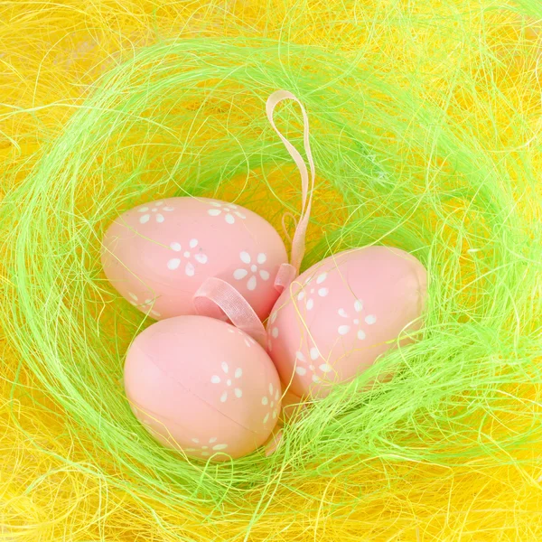 stock image Easter eggs in the yellow nest