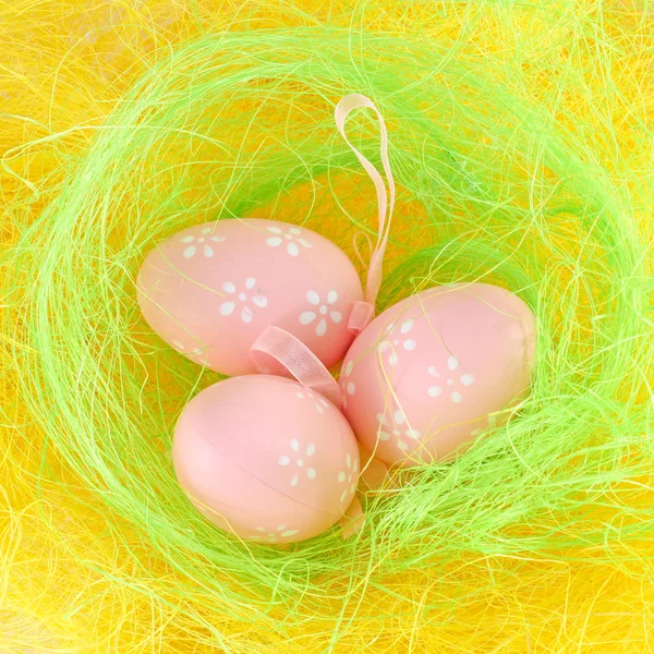 stock image Easter eggs in the yellow nest