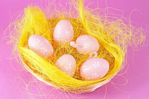 stock image Pink eggs in the basket