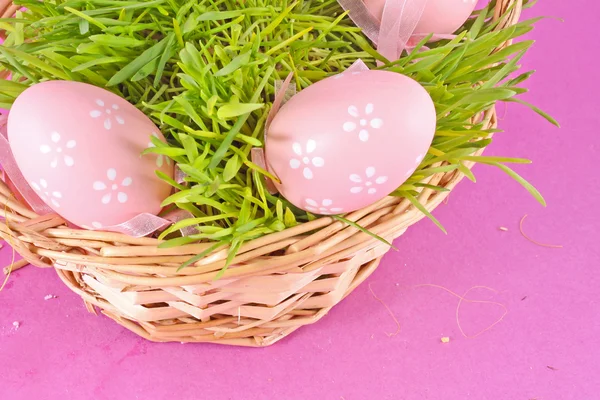 stock image Colorful painted easter eggs in basket