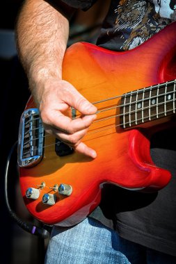 Man playing electrical guitar clipart