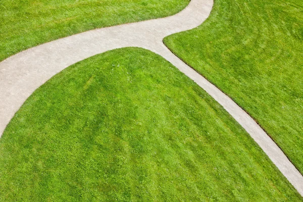 Sandy path - pavement and grass — Stock Photo, Image