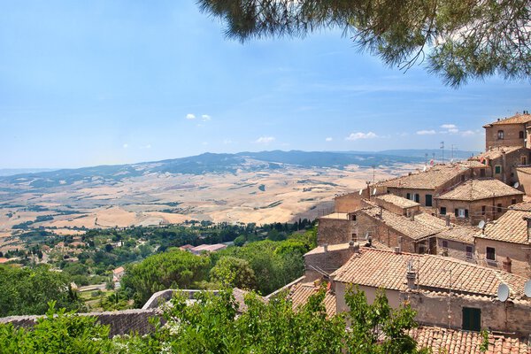 View of the roofs and landscape of a small town 