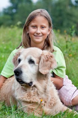 Little girl and her beloved dog clipart