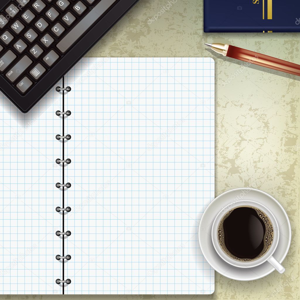 office desk with keyboard coffee and notepad
