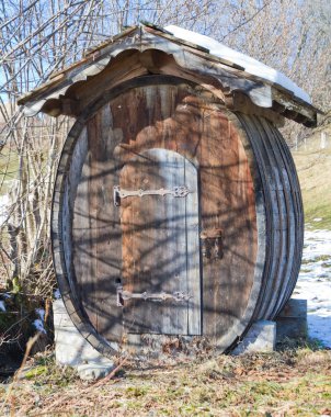 Hobbit cabin built in wooden barrel clipart