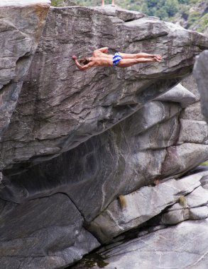 Cliff divers compete for WHDF title. clipart