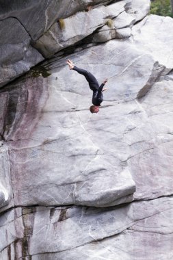 Cliff divers compete for WHDF title. clipart