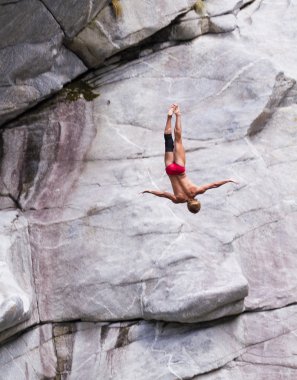 Cliff divers compete for WHDF title. clipart