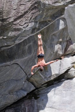 Cliff divers compete for WHDF title. clipart