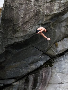 Cliff divers compete for WHDF title. clipart