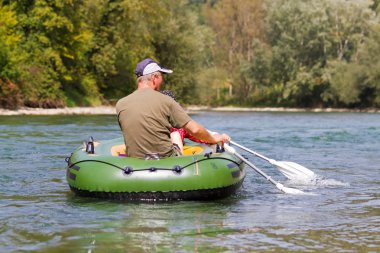 Orta yaşlı çift kürek