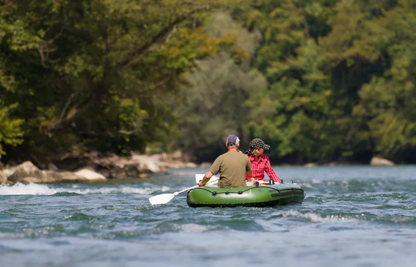 Middle aged couple rafting — Stock Photo, Image