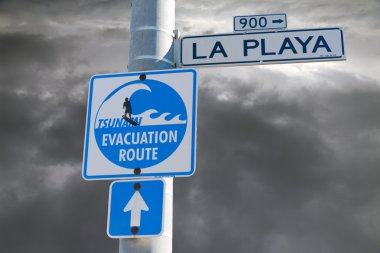 Tsunami evacuation route sign clipart