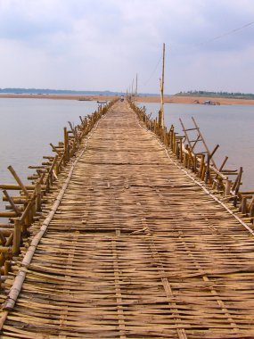 Long bamboo bridge from Kampong Cham to island clipart