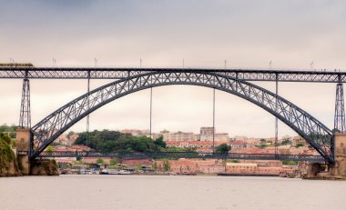 Vintage look of bridge in Porto, Portugal clipart