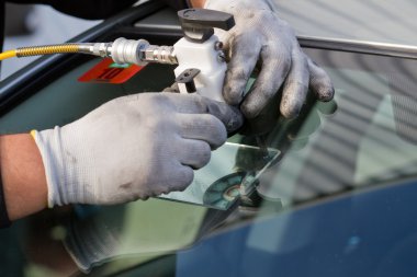 Repair crack in windshield clipart