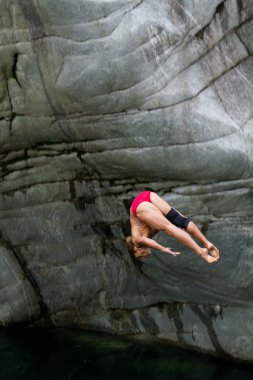 Cliff divers compete for WHDF title. clipart