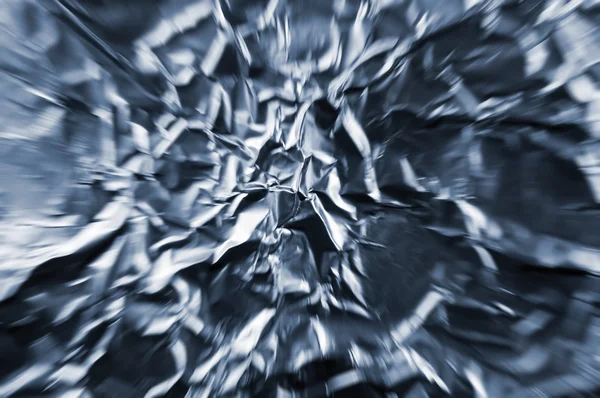 Abstract zoom tunnel of crumpled silver aluminum foil closeup — Stock Photo, Image