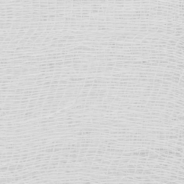 白い医療包帯ガーゼ テクスチャ、抽象的な織り目加工の背景 — ストック写真