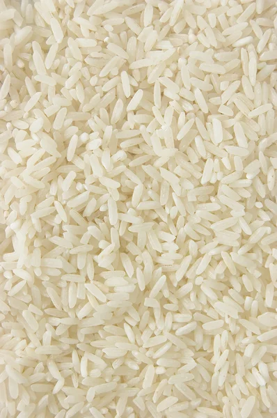 Белый длинный рисовый фон, сырые невареные крупы, макро крупный план — стоковое фото