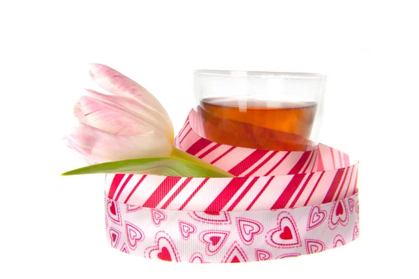 A cup of tea with a ribbon — Stock Photo, Image