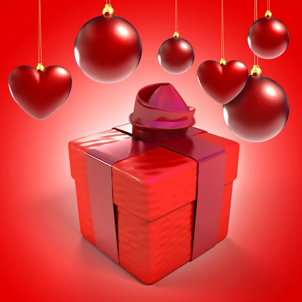 Karácsonyi baubles és a szív-és ajándék doboz felett piros háttér — Stock Fotó