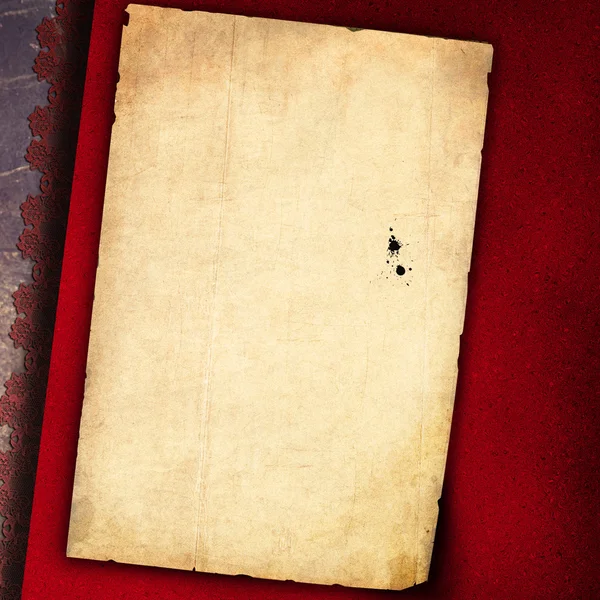 Старый документ на красном фоне — стоковое фото