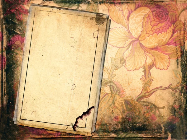 Oud papier op grunge achtergrond met florale versieringen — Stockfoto