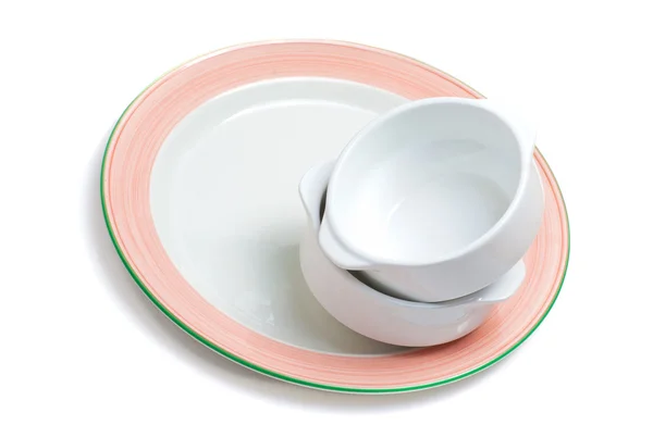Пачка пустых чаш на тарелке — стоковое фото