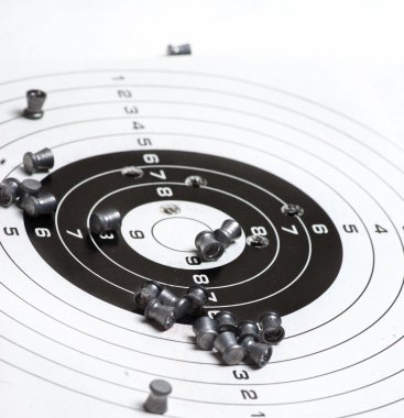 Paper rifle target with bullet holes clipart