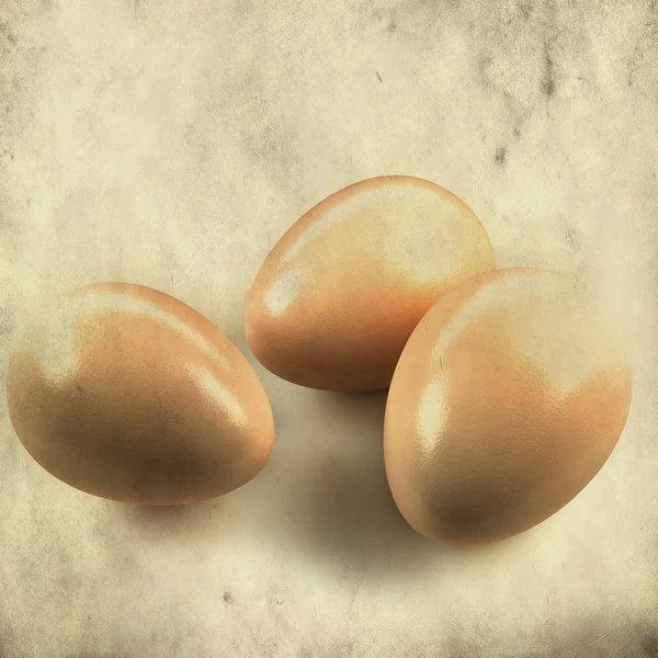 Gestructureerde oud papier achtergrond met eieren — Stockfoto