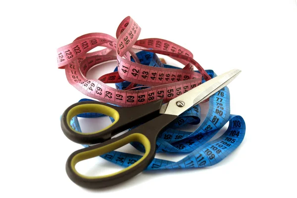 stock image Tailoring scissors and colored meters