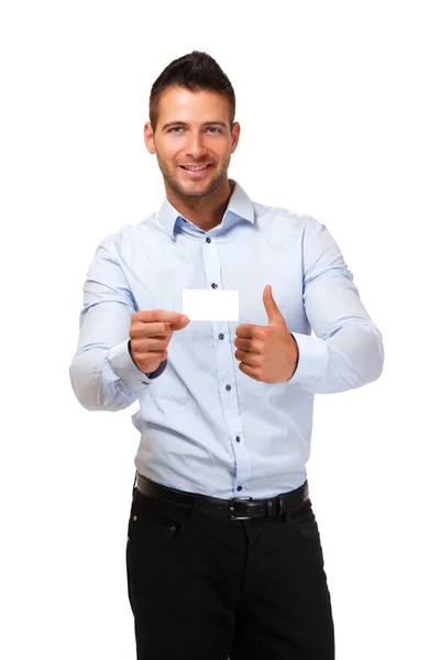 Feliz hombre de negocios con el pulgar hacia arriba y sosteniendo una tarjeta de visita en blanco —  Fotos de Stock