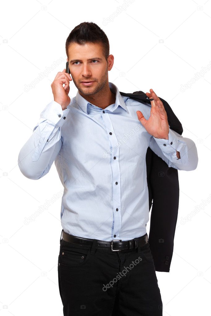Serious businessman making a call