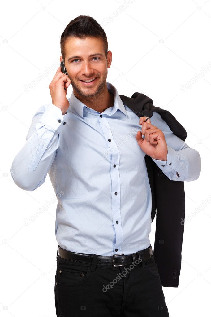 Portrait of a happy businessman making a call