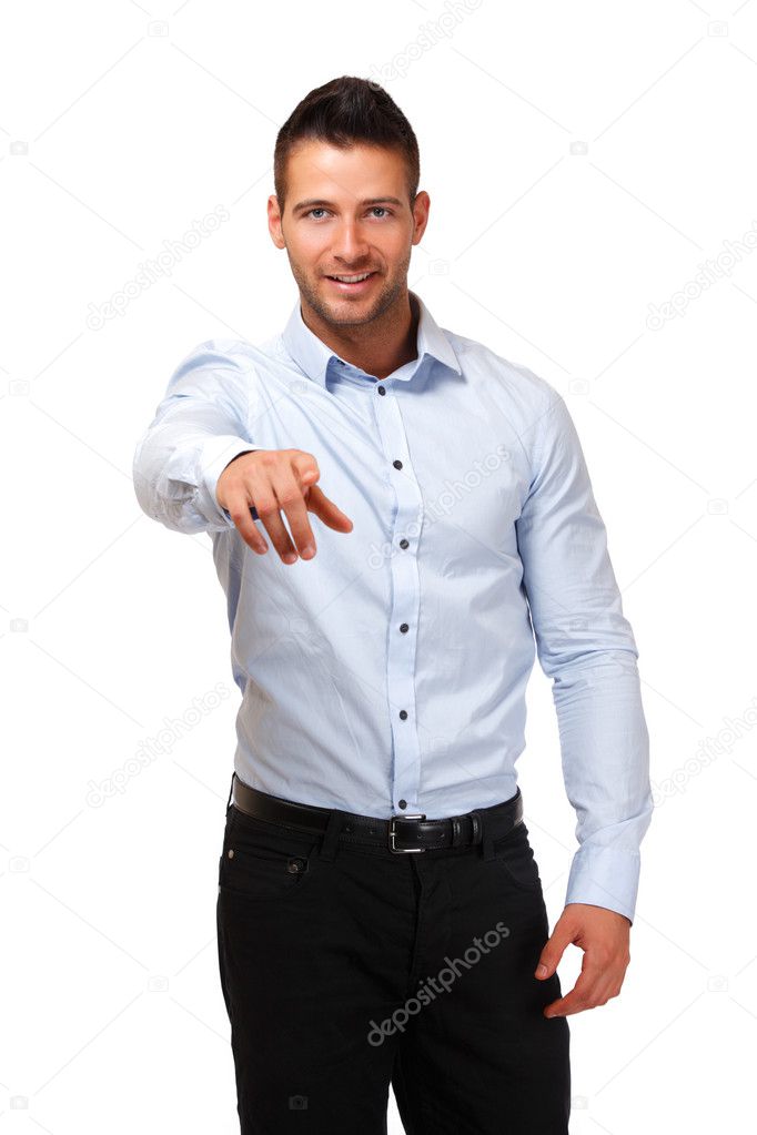 Young businessman pointing at you