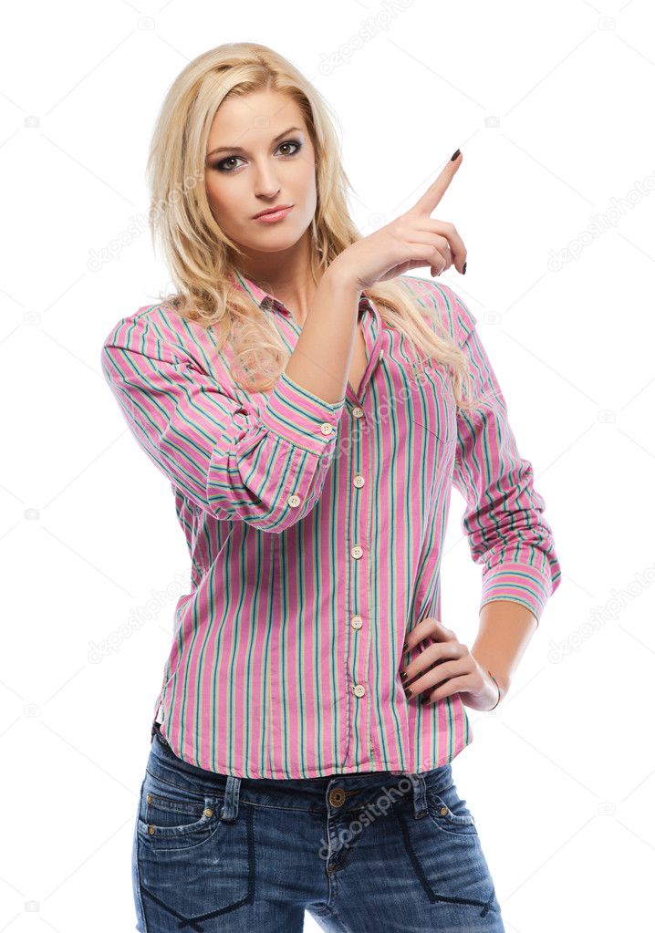 Nice blonde woman pointing at copyspace