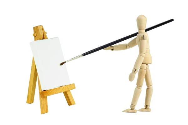 Wooden mannequin with easel — Stock Photo, Image