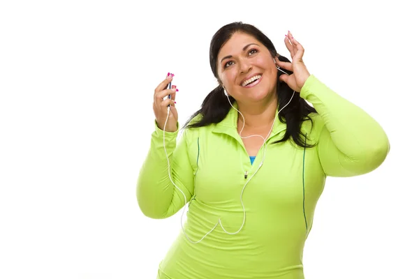 Mulher hispânica em roupas de treino com leitor de música e fones de ouvido — Fotografia de Stock