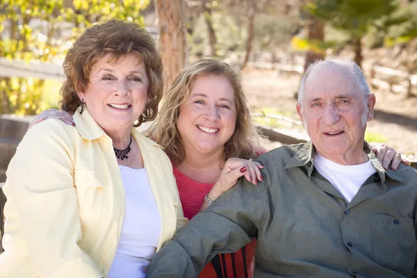 Senior Couple with Daughter in the Park — Stock Photo, Image