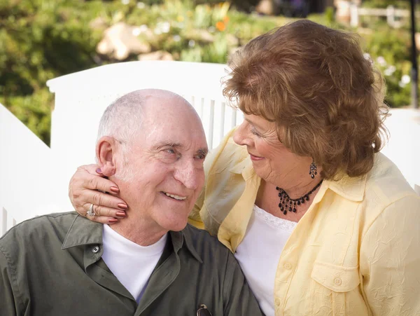 Senior Couple Kissing in the Park — Stock Photo, Image
