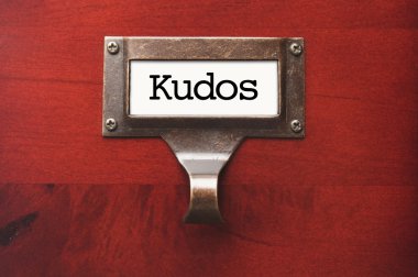 Lustrous Wooden Cabinet with Kudos File Label clipart