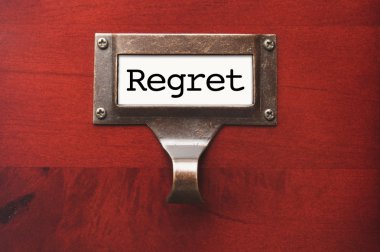 Lustrous Wooden Cabinet with Regret File Label clipart