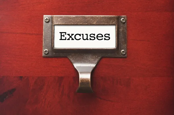Lustrous Wooden Cabinet with Excuses File Label — Stock Photo, Image