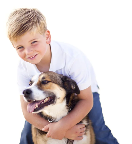 Pohledný mladík hraje s jeho pes izolované — Stock fotografie