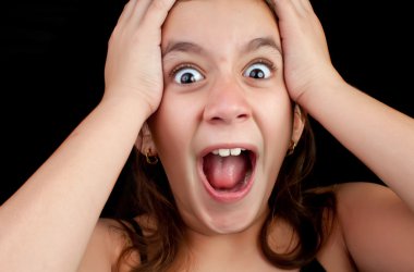 Girl screaming loudly on a black background clipart