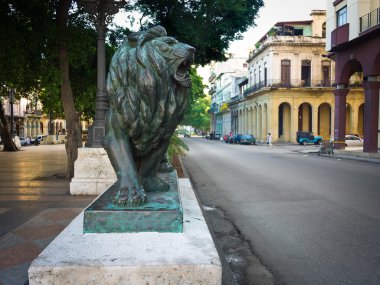 Lion in the boulevard of El Prado in Havana clipart