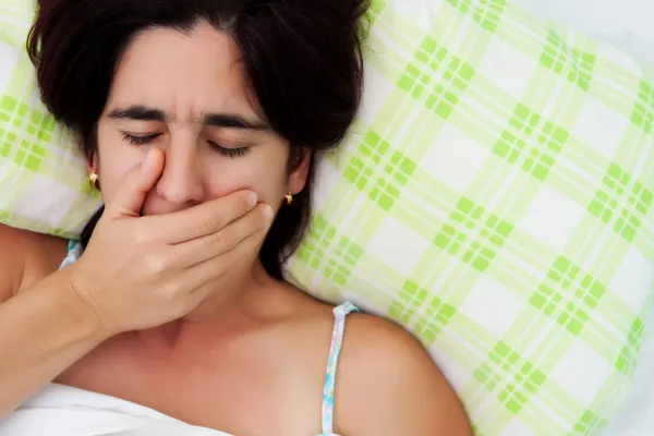 Spansktalande kvinna känsla av illamående — Stockfoto